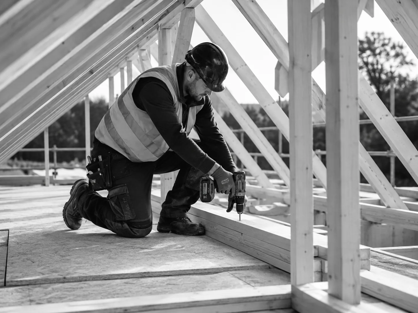 Carpenter working in a roof structure